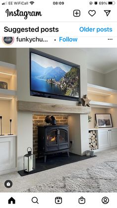 an instagram photo of someone sitting in front of a fireplace with the tv on