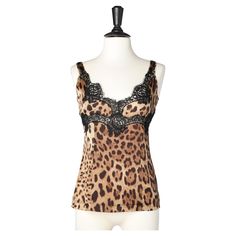 Silk leopard tank top with lace. SIZE 40 (It) S Chic Leopard Print Sleeveless Top, Elegant Sleeveless Leopard Print Tops, Fitted Leopard Print Camisole With Spaghetti Straps, Fitted Leopard Print Cami Tank Top, Chic Leopard Print Cami Top, Fitted Leopard Print Camisole, Leopard Print Sleeveless Top With Built-in Bra, Sleeveless Leopard Print Top With Built-in Bra, Stretch Leopard Print Tops With Built-in Bra