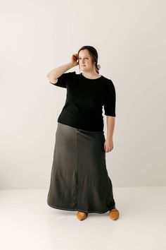 With the look of real denim but the feel of a quality knit, comfort is the key element in our exclusively designed Caroline skirt. The quick, pull on style makes this skirt an effortless option for wherever your day might take you - running errands, making dinner, playing with the kids, or a quick trip to the coffee shop to grab your favorite latte. Soft, comfortable knit denim fabric 65% Cotton 30% Polyester 5% Spandex Wash on gentle cycle in cold water, Hang to dry Fabric covered elastic waist Making Dinner, Knit Denim, Long Knit, Knit Skirt, The Coffee, Modest Outfits, Denim Fabric, Fabric Covered, Soft Knits