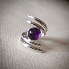 Adjustable Hallmarked Purple Rings, Nickel-free Purple Rings For Jewelry Making, Handmade Adjustable Sterling Silver Amethyst Ring, Adjustable Sterling Silver Amethyst Ring Gift, Adjustable Nickel-free Purple Ring, Adjustable Hallmarked Silver Amethyst Ring, Elegant Purple Nickel-free Rings, Silver Amethyst Cabochon Rings, Adjustable Purple Cabochon Ring