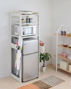 three different types of kitchen shelvings in various colors and sizes, including one with a microwave on top