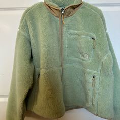 Never Worn, New Without Tags. Size Xl. Sage Green Green Fleece Outerwear With Pockets, Cozy Green Outerwear With Pockets, The North Face Fleece Outerwear For Cold Weather, Cozy Green Fleece Jacket With Pockets, The North Face Green Winter Outerwear, Green Sherpa Outerwear With Fleece Lining, Green Winter Outerwear By The North Face, Coats North Face, North Face Coat