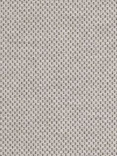 an upholstered fabric textured with small squares in light grey and white colors