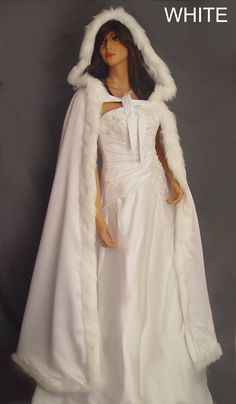 "Gorgeous hooded medieval bridal faux fur trim full length wedding cloak, made from luxurious high quality satin. Entirely lined on the inside with the same matching satin as the exterior layer & completely trimmed with high quality feathery Long faux fur all the way around. Secured at the neck with matching satin ties. This item is newly made and ready to ship. Over sized hood is large enough to comfortably fit over high hairstyles & tiaras or headpieces. One size fits all. Measures approx: 56\ Ice Witch Costume, Winter Costume Ideas, Snow Fairy Costume, High Hairstyles, Ice Princess Costume, Medieval Cape, Snow Queen Dress, Queen Accessories, Witch Ideas