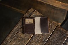 A quality made leather folding wallet, hand stitched for durability, and available in various quality leather options and colors. ... Built and ready to go. Typically ships within 2 business days. Slim profile wallet packs a lot and they work great as a front pocket and back pocket wallet. Holds 12 cards comfortably Cut and saddle stitched by hand in North Idaho Stitching is guaranteed for life. U.S. native steer hide 3-4oz thick leather W 3" x H 4.25" x D 5/8" (when full on average) See more ph North Idaho, Horween Leather, Pocket Wallet, Ink Stamps, Leather Conditioner, Fold Wallet, Burgundy Color, Watch Strap, Idaho