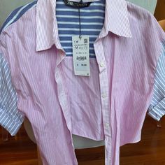 Zara Medium Combination Striped Crop Shirt Button Front Short Sleeve Tie Front Brand New W Tag!! Size Medium Article No- 2904/678/046 Brand - Zara Color - Pink Garment Care -Machine Washable Type -Button-Up Closure Tie Sleeve Length -Short Sleeve Material -100% Cotton Season - Spring, Summer Size - M Neckline -Collared Occasion -Casual, Party/Cocktail, Travel Style - Cropped Fit -Classic Pattern -Striped Make Me An Offer! If You Have Any Questions, Please Feel Free To Ask! :) Zara Pink Button-up Top, Zara Pink Tops With Buttons, Zara Pink Blouse With Button Closure, Pink Zara Blouse With Button Closure, Pink Collared Zara Top, Zara Pink Collared Tops, Zara Pink Button-up Blouse, Zara Pink Shirt For Work, Zara Pink Cotton Shirt