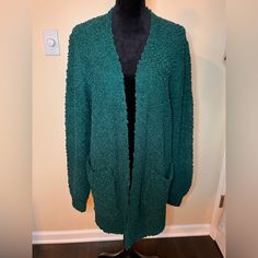 Beautiful Soft Cardigan, Striking Teal Color. Brand New Without Tags, Very Soft And Has Pockets. Cross Posted. Green Bohemian Long Sleeve Cardigan, Green Long-sleeved Cardigan With Pockets, Teal Cardigan, Non-stretch Bohemian V-neck Cardigan, Non-stretch V-neck Bohemian Cardigan, Soft Cardigan, Teal Color, Teal Colors, Front Open