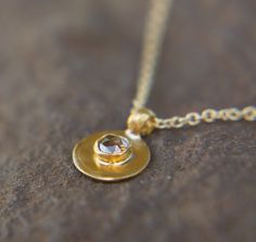 "24k gold diamond pendant//unique gold pendant//solid gold pendant//24k gold diamond pendant//rose cut diamond pendant//24k gold diamond 24k gold pendant 0.4\" with a 3 mm rose cut diamond (0.3 ct) the chain is made out of 14K gold , about 16- 18 inches (40-45 cm) .can be customized. charm is 10 mm , 0.4 inch diameter 24k gold . solid gold. 24k solid gold is a lifetime jewelry, with just the perfect look . can be worn daily and over night for those who never want to take it off. i have full conf Gold Diamond Pendant Necklace With Gemstone, Gold Diamond Necklace With Gemstone Pendant, Gold Diamond Teardrop Pendant Necklace, Gold Teardrop Pendant Diamond Necklace With Single Cut Diamonds, Gold Teardrop Pendant Diamond Necklace With Gemstone, Gold Pendant Diamond Necklace With Bezel Setting, Gold Diamond Necklace With Teardrop Gemstone Pendant, Gold Necklace With Rose Cut Diamonds, Dainty Gold Diamond Necklace With Rose Cut