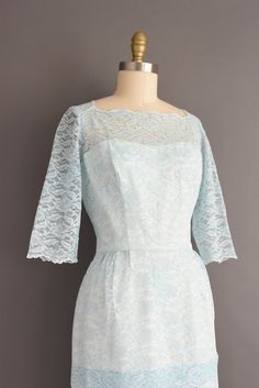 "Gorgeous vintage 1950s cocktail party dress in a wonderful icy blue color with a lovely lace overlay throughout. This vintage dress features a very flattering fitted bodice with bust darts, nipped waist, and a pencil skirt. Back zipper for closure. ✂------ M E A S U R E M E N T S ------- Best Fit: Medium Bust: 37.5\" Waist: 28.5/29\" Hips: 41.5\" Shoulders: 15.5\" Sleeves: 16\" Total Length: 43\" Material: lace Condition: Excellent vintage condition. Ready to wear. ☆ Layaway is available for th Light Blue Fitted Lace Dress, 1950s Fitted Lace Dress, 1950s Cocktail Party, 50s Dresses, Mint Blue, Cocktail Party Dress, Icy Blue, Dress Medium, Lace Overlay