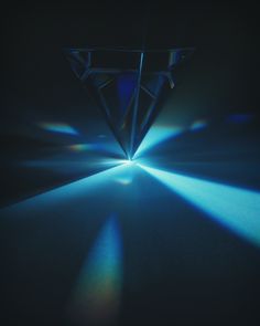 an image of a diamond in the middle of a room with light coming through it