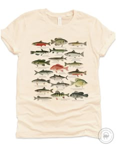 * Design is a compilation of beautiful illustrations by Sherman F. Denton (1856-1937) of North American fishes, published in 1913. * Perfect gift for fisherman, nature enthusiast and outdoorsman in your life.  Printed on super soft premium cotton shirts - you will love wearing it! * Printed with Direct to Garment textile printer, creating soft to touch (i.e no layer on top of the shirt) full-color print that does not fade. Not an iron-on or heat transfer! * Shirts are in Unisex/Men's sizing, pre Fish Clothes, Fish T Shirt, Gift For Fisherman, Silly Shirt, Nature Enthusiast, Fish Shirt, Red Snapper, Fisherman Gifts, Nature Shirts