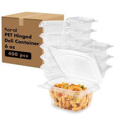 plastic food containers with lids are stacked on top of each other in front of a cardboard box