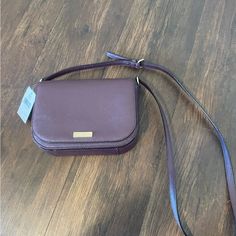 Kate Spade Crossbody Bag New With Tags Dark Purple Kate Spade Crossbody Shoulder Bag With Removable Pouch, Kate Spade Crossbody Shoulder Bag With Phone Pocket, Kate Spade Crossbody Shoulder Bag For Mobile Phone, Kate Spade Crossbody Mobile Phone Bag, Elegant Kate Spade Bag With Cell Phone Pocket, Kate Spade Crossbody Bag With Adjustable Strap, Trendy Kate Spade Shoulder Bag With Adjustable Strap, Kate Spade Versatile Crossbody Bag, Kate Spade Crossbody Satchel