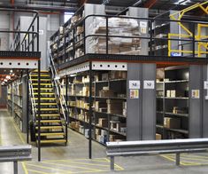 an industrial warehouse filled with lots of shelves