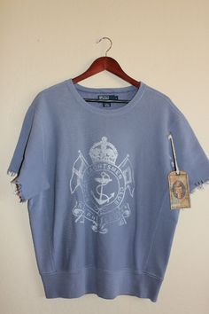 Polo Ralph Lauren 'Naval Yachtsmen Club' S/S Cutoff Sweater Blue Size: Large 87% cotton 13% acrylic w/ paint/bleach splatters 100% AUTHENTIC GUARANTEED!! Happy bidding! PLEASE CHECK OUT MY OTHER AUCTIONS FOR MORE GREAT DEALS ON AUTHENTIC DESIGNER SHOES, DESIGNER HANDBAGS, DESIGNER WALLETS, DESIGNER CLOTHES, AND OTHER GREAT DESIGNER ITEMS!!!! Wallets Designer, Handbags Designer, Designer Wallets, Designer Items, Tag Sale, Blue Pattern, Blue Sweaters, Vintage Look, Vintage Looks