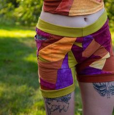 Made to Order-One of a kind patchwork short shorts made with various KNIT fabrics and include two pockets. Model pictured is size XS for reference. Fitted Patchwork Shorts For Summer, Fitted Cotton Shorts For Festivals, Summer Festival Shorts With Patchwork, Fitted Multicolor Shorts For Festival, Multicolor Patchwork Cotton Shorts, Hippie Patchwork Shorts For Festival, Hippie Style Bottoms With Built-in Shorts, Patchwork Short Bottoms For Festival, Multicolor Patchwork Shorts For Festival