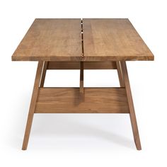 a wooden table with one section missing from the top