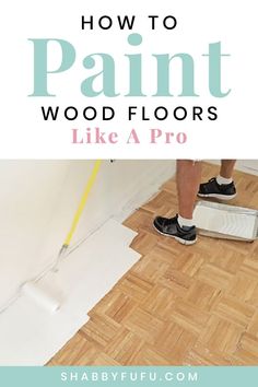 a person is painting the floor with white paint on it and text overlay reads how to paint wood floors like pro