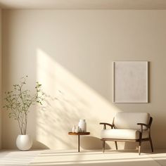 an empty room with a chair, table and vase on the floor next to it