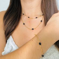 The black bead necklace is elegant, simple, and beautiful to wear daily. This necklace is an excellent gift for a woman who loves jewelry and needs something easy to pull on with any outfit! We also have the matching pulse in case you would like the Set; I will leave the link below. Material: 18k Gold Filled -16, 18, and 20-inches necklace  -4 mm wide -Perfect for all time. -High-quality Chain.  FAST & FREE SHIPPING! Our handmade products are rated very highly by our customers. We work hard with Elegant Black Beaded Necklace With Tiny Beads, Elegant Black Crystal Necklace With Beaded Chain, Elegant Black Beaded Necklace For Everyday, Black Beaded Necklaces For Everyday, Elegant Double Strand Beaded Necklace With Black Beads, Elegant Crystal Necklace With Black Beads For Gift, Elegant Black Beaded Crystal Necklace For Gift, Black Beaded Chain Necklace For Everyday, Everyday Black Necklace With Beaded Chain