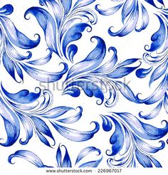 a blue and white wallpaper with swirls on it