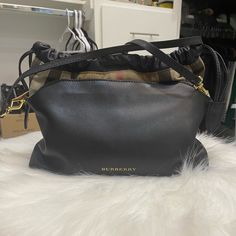 Used In Good Condition Leather Purse, It Has A Shoulder Strap With It’s Dust Bag Button Closes And Has The Two Side Pullers To Close Bag Tight. Burberry Black Purse, Burberry Purse, Leather Purse, Burberry Bag, The Two, Leather Purses, Burberry, Dust Bag, Shoulder Strap