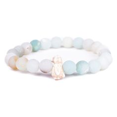 Give friends and family meaningful jewelry with a mission. This bracelet from Fahlo is enhanced with an assigned real penguin to track online. A portion of all proceeds is donated to the Global Penguin Society. Help save the penguins with a beautiful sky stone beaded bracelet with penguin charm and learn your penguin's name, size and get their picture. Each bracelet comes with a different real wild animal to track on your phone, tablet or computer. | Stretch bracelet features penguin and igloo s Penguin Bracelet, Tracking Bracelet, Pokemon Jewelry, Penguin Species, Letter Bead Bracelets, Small Bracelets, Cute Bedroom Decor, Meaningful Jewelry, Stretch Bands