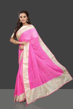 Look bright and beautiful in this striking pink color leheriya print chiffon saree! The saree is enhanced with beige border and comes with cream saree blouse. Shop designer sarees in USA from Pure Elegance. Cream Saree Blouse, Cream Saree, Fashion Journals, Traditional Fabric, Bright And Beautiful, Saree Online, Chiffon Saree, Designer Sarees, Pure Silk Sarees