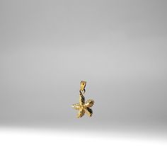 With arms spread wide, it shines so bright. A gold starfish charm necklace, in your sight.  This 14K gold Starfish Pendant features a three-dimensional representation of a starfish, with its arms spread out to create a realistic and detailed look. The intricate patterns on the starfish's surface add texture and depth to this gold starfish necklace. Let your spirit shine with this beautiful and unique nautical pendant. Showcase your love for the seas with sea life jewelry such as this starfish pe Gold Ocean-inspired Charm Necklaces As Gift, Gold Ocean-inspired Charm Necklaces For Summer, Starfish Necklace Gold, Adjustable Gold Ocean-inspired Charm Necklace, Ocean Starfish, Gold Shell-shaped Necklace With Starfish Charm, Gold Seahorse Pendant, Starfish Jewelry, Sea Life Jewelry