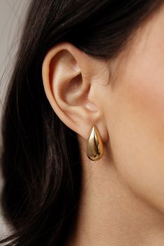 Elevate any outfit with these must-have Céline - gold teardrop stud earrings. As statement earrings, they provide an instant touch of sleek sophistication. These earrings are the perfect addition to any jewelry collection. MATERIAL: 18k PVD Gold plated Water resistant, tarnish resistant, hypoallergenic, & nickel/lead free. Minimalist Formal Drop Earrings For Pierced Ears, Modern Tarnish Resistant Teardrop Earrings For Formal Occasions, Modern Durable Teardrop Earrings For Formal Events, Minimalist Formal Drop Earrings, Timeless Teardrop Tarnish-resistant Earrings, Minimalist Tarnish Resistant Teardrop Earrings For Formal Occasions, Minimalist Tarnish-resistant Teardrop Earrings For Formal Occasions, Gold Plated Teardrop Earrings For Formal Occasions, Modern Gold Plated Teardrop Earrings For Formal Occasions