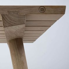 a close up of the top of a wooden structure