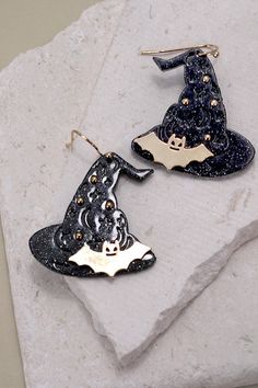 Halloween Witch Hat Drop Earrings are a bewitching addition to your Halloween ensemble. These earrings feature intricately crafted witch hat designs dangling from delicate hooks, adding a touch of spooky fun to your look.?? Product details:width: 1.25" length: 1.5"earring back: Fish Hookmetal finish: gold Platingproduct: Lead & Nickel Compliantanti-tarnish: Double E-coating Witch Hat Drop Earrings | Halloween Earrings | Witch Earrings | Spooky Earrings | Halloween | Magical | Spooky season jewel Adjustable Witchy Earrings For Halloween, Witchy Halloween Earrings Adjustable, Witchy Adjustable Earrings For Halloween, Spooky Earrings, Witch Earrings, Halloween Witch Hat, Witches Hat, Black Pearls, Earrings Halloween