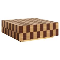 a wooden box with brown and white checkered design on it's sides, in the shape of a cube