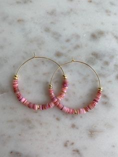 Two sizes to choose from - large hoops and medium with 5mm Heishi shell in pink or neutral! Do not get wet, do not swim or shower with them on Pink Hoop Earrings, Gold Hoop, Gold Hoop Earrings, Delicate Bracelet, Hippie Boho, Etsy Earrings, Shells, Handmade Items, Hoop Earrings