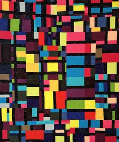 an abstract quilt with multicolored squares and lines on black fabric, which is very similar to the pattern used in this project