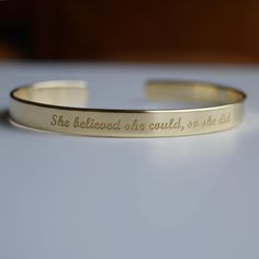 "Whether you're a minimalist, an adventurer, a fashionista, or a sentimental soul, our gold plated bracelets offer a variety of customization options to suit your unique taste. - Gold plated bracelet engraved with your chosen message. - The  thickness of gold plating is around 0.5 microns - Text, coordinates, numbers or handwriting outside and inside the cuff  - The color doesn't wear off - Up to 90 characters  on each side - Approximately 0.25 inch wide (6.3mm), 6.3 inch long (16cm) - Laser engraved - the engraving is burned into the material using a laser beam.  SIZE This is the length of the metal, not including the opening between the ends. The bracelets are adjustable. 4\" (baby/toddler size) 5\" (child size) 6.3\" (standard - fits MOST adults) 7\" (popular for men) GOLD LAYER Gold pl Adjustable Cuff Bracelet With Engraving Option, Meaningful Engraved Cuff Bracelet As Gift, Adjustable Engraving Option Cuff Bracelet, Personalized Engraved Bangle, Engraved Adjustable Bangle Name Bracelet, Engraved Bangle Bracelet For Personalized Gift, Gift Gold Etched Cuff Bracelet, Adjustable Bangle With Engraving Option, Adjustable Engraved Bangle For Personalized Gift