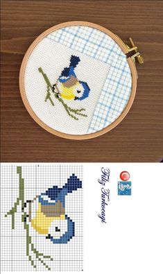 a cross stitch pattern with a blue bird on it