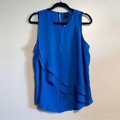 Worthington Blue Layered Draped Front Sleeveless Top Nwt Size L Condition: Nwt, No Apparent Flaws Blue Relaxed Fit Sleeveless Top, Blue Sleeveless Tank Top With Button Closure, Blue V-neck Camisole For Daywear, Moisture-wicking Cotton Blue Tank Top, Blue Moisture-wicking Sleeveless Tank Top, Sleeveless Top, Womens Tops, Blue, Women Shopping