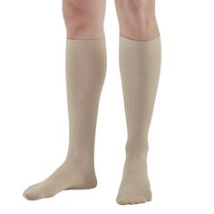 These AW Style 638 Men's Microfiber Knee High Socks are a mild support sock, made from microfiber nylon, having a fashionable rib pattern, and mild graduated compression of 8-15 mmHg. These socks are as comfortable as they are helpful! Physician recommended to relieve minor aches and pains from swollen feet and legs, minor varicosities, and achy legs. Features: Fashionable rib knit Reciprocated heel and wide toe pocket Comfortable, wide top band for superior "stay up" performance Made in the USA Aw Style, Achy Legs, Support Socks, Top Band, Toe Socks, Compression Socks, Athletic Socks, Socks And Sandals, Knee High Socks