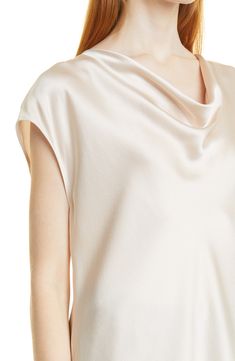 Timelessly chic, this silk popover blouse brings easy elegance to your look with a flattering draped cowl neck and dolman sleeves. 23" length (size Medium) Cowl neck Short sleeves 100% silk Dry clean or hand wash, line dry Imported Elegant Spring Tops With Cowl Back, Elegant Cowl Neck Blouse For Spring, Silk Top With Draped Sleeves For Work, Elegant Cowl Neck Top For Work, Silk Tops With Draped Sleeves For Work, Chic Evening Blouse With Cowl Neck, Spring Silk Tops With Cowl Neck, Silk Draped Blouse, Chic Cowl Neck Evening Blouse