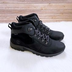 New In Box- Timberland Women’s Mt Maddsen Waterproof Mid Hiker Boots In Black Full Grain Leather With Timberdry Technology, Anti Fatigue Footbeds, Eva Midsoles And Rubber Lug Outsoles. Timberland Waterproof Boots With Vibram Sole For Winter, Timberland Black Hiking Boots For Adventure, Black Waterproof Ankle Hiking Boots, Black Waterproof Ankle Boots For Outdoor, Black Winter Hiking Boots For Adventure, Timberland Ankle Hiking Boots For Outdoor Activities, Black Weatherproof Adventure Boots, Black Round Toe Work Boots For Adventure, Timberland Black Hiking Boots For Outdoor Activities