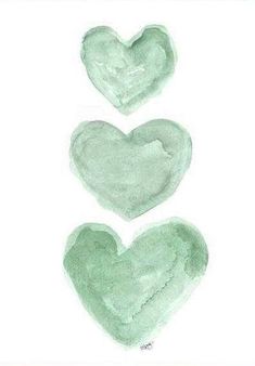 three watercolor hearts on a white background