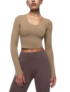 PRICES MAY VARY. Cream Collection Top: Crop tops are made from soft fabric that feels cream smooth on your skin. They are lightweight, breathable, quick-drying, moisture-wicking and resistant to sweat stains brings you the best sports experience. Removable Padding Bra: Yoga crop tops for women feature an inner removable cups with hidden small opening on both sides, easy to clean and adjust. The pad cups provide support and shock protection. U Neck Design: Athletic shirts tops cut with flattering Sides Easy, Yoga Crop Tops, Yoga Tees, Athleisure Tops, Sweat Stains, Workout Crop Top, Athletic Top, Top Crop, Womens Long Sleeve Shirts