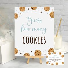 there is a sign that says guess how many cookies are in front of the card