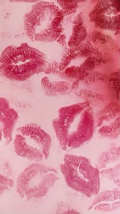 pink lipstick imprints on a white background