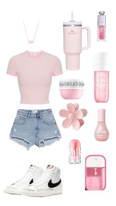 a pink shirt, denim shorts and white sneakers