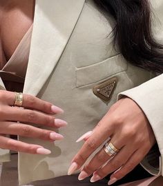 a woman with two rings on her fingers