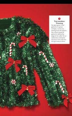 a green christmas sweater with candy canes and bows