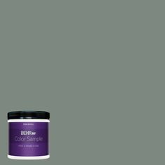 a can of behro color sample on a white background