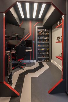 a room with red and black shelves filled with toy items on top of each shelf